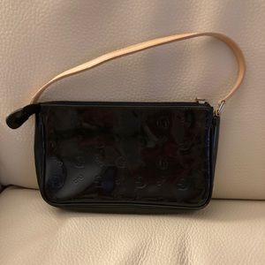 Black patent leather party purse.